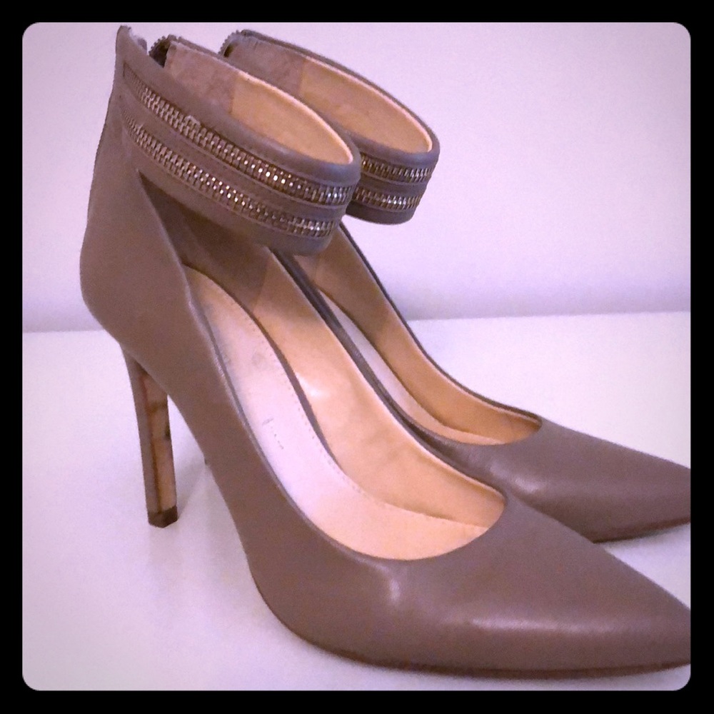 Ankle strap pumps with zipper detail.  Size 7